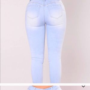 Fashion nova high waist ripped jeans.